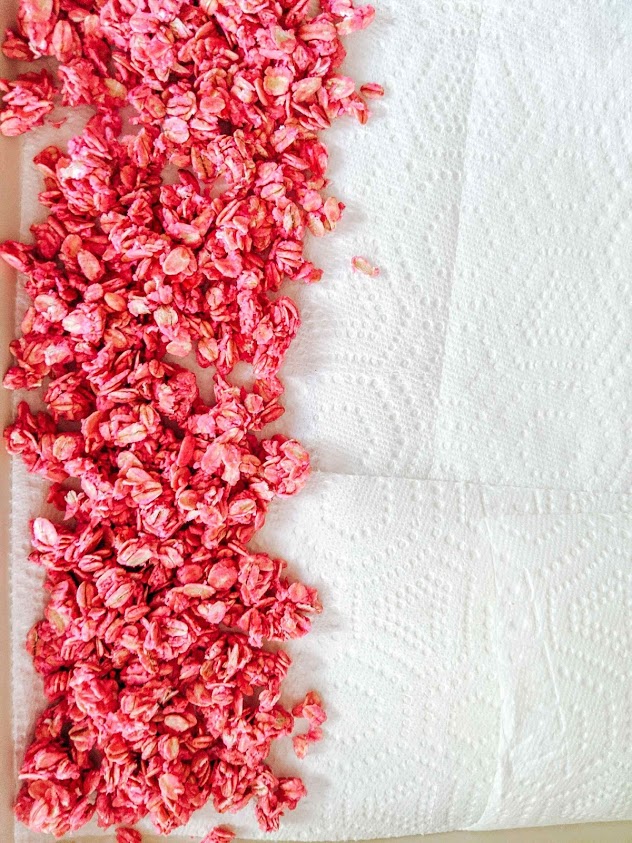 Dry the rainbow oats on a paper towel 